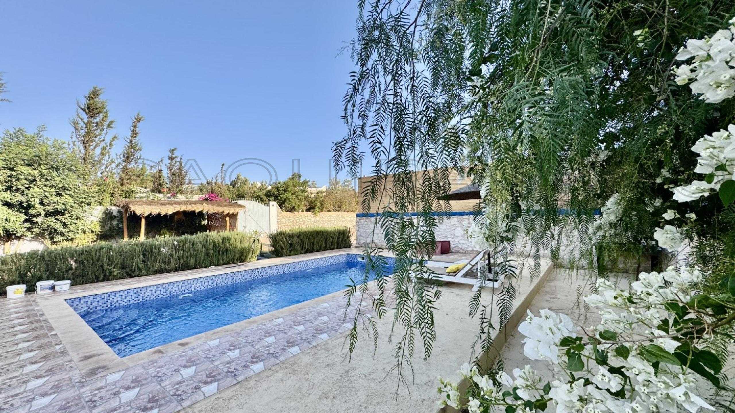 villa avec 2 chambres et 2 salles de bain