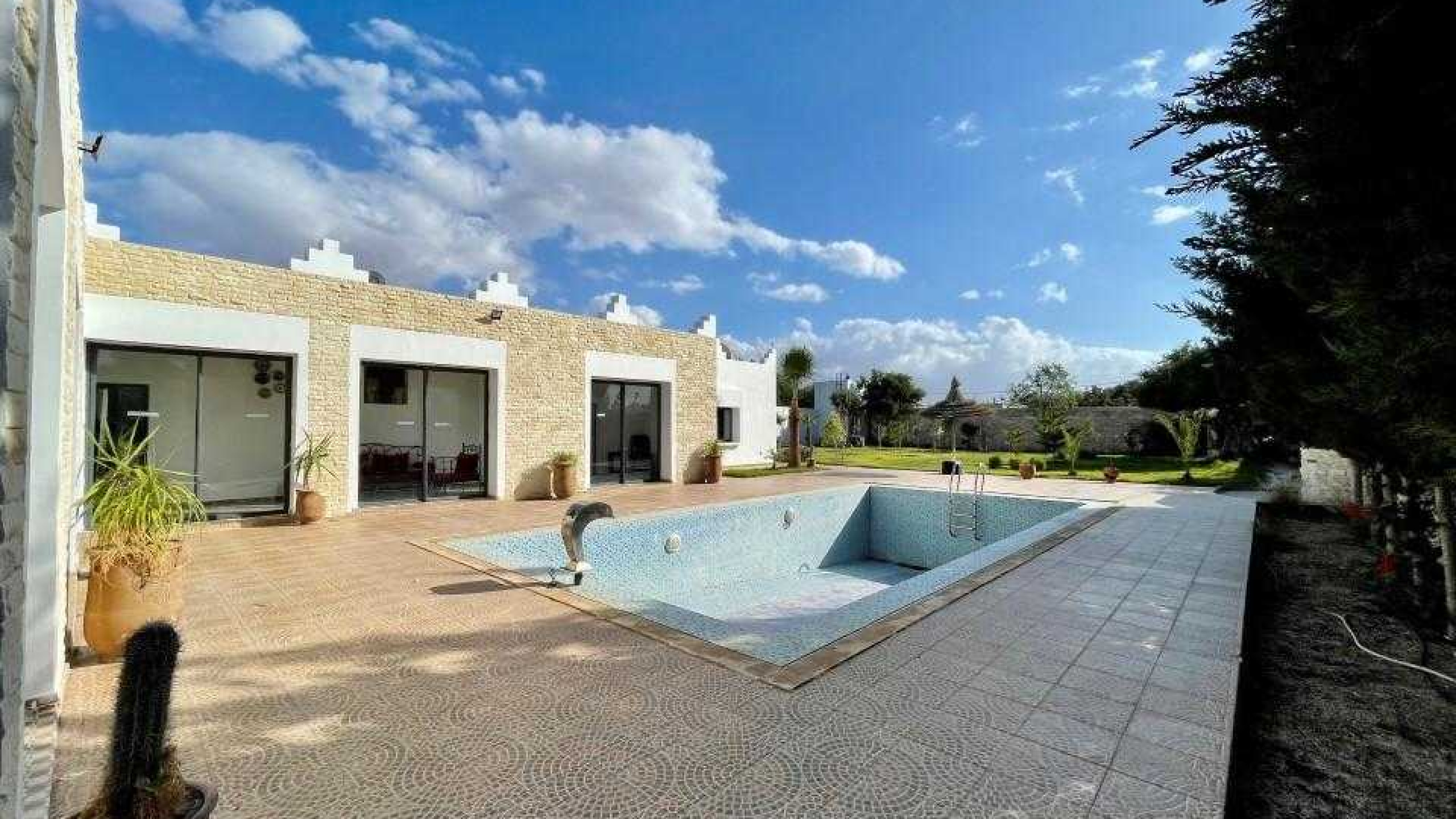 villa avec 4 chambres et 4 salles de bain