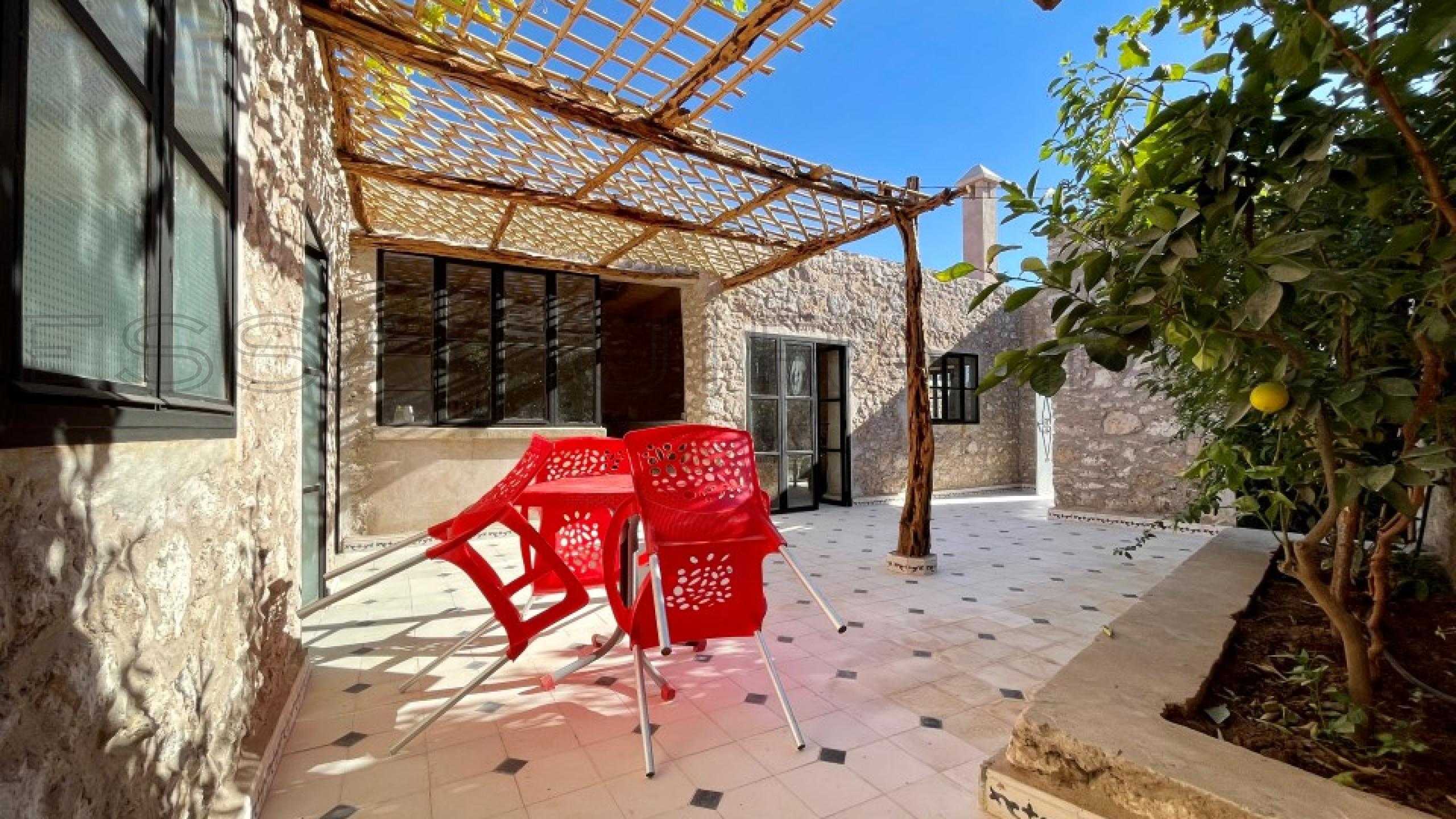 maison de 100 m&sup2; sur un terrain de 400 m&sup2;