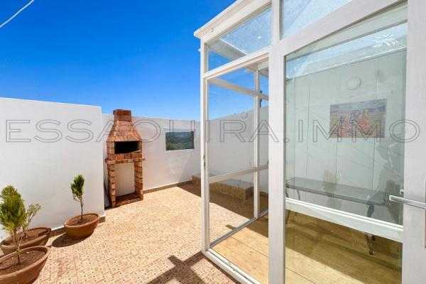 Appartement avec terrasse et véranda privatives 