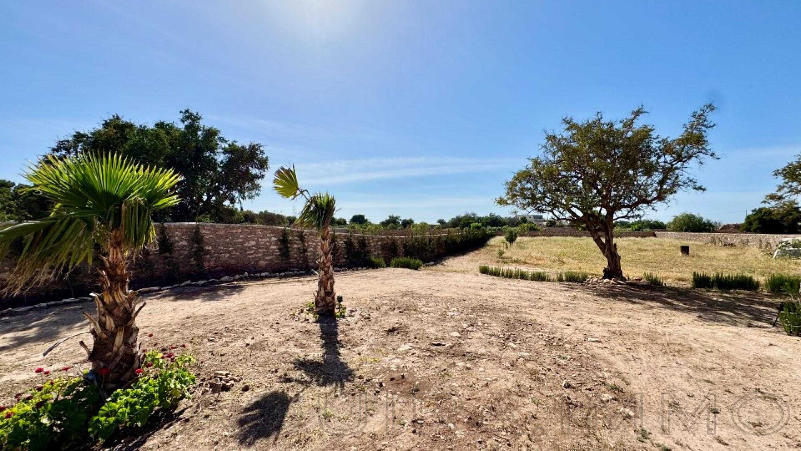 maison de 80 m² sur un terrain de 3,300 m²