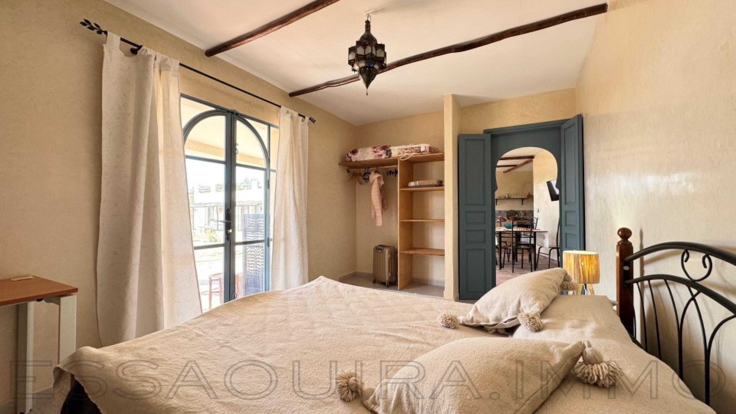 maison avec 2 chambres et 1 salle de bain