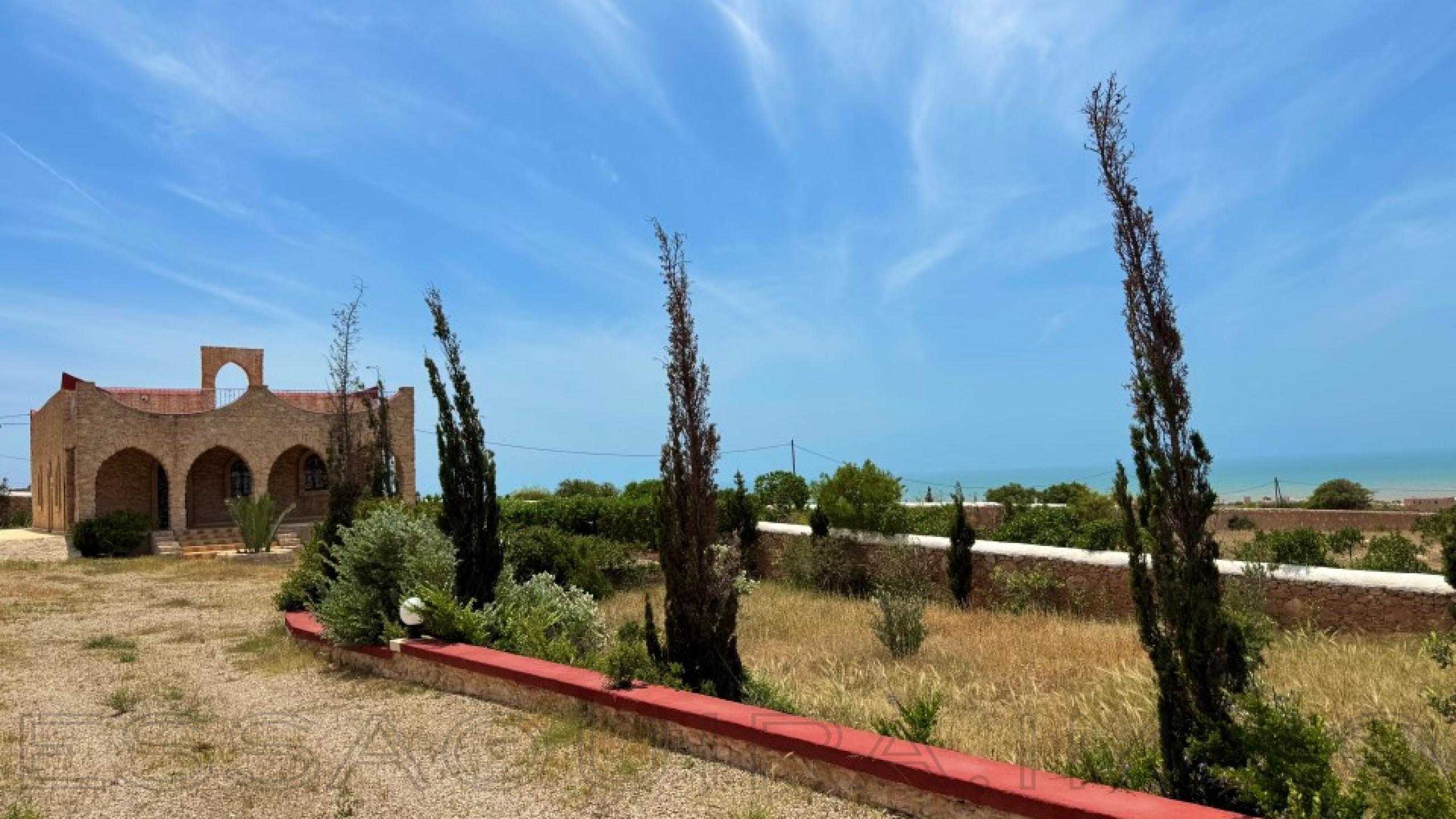 villa avec puits