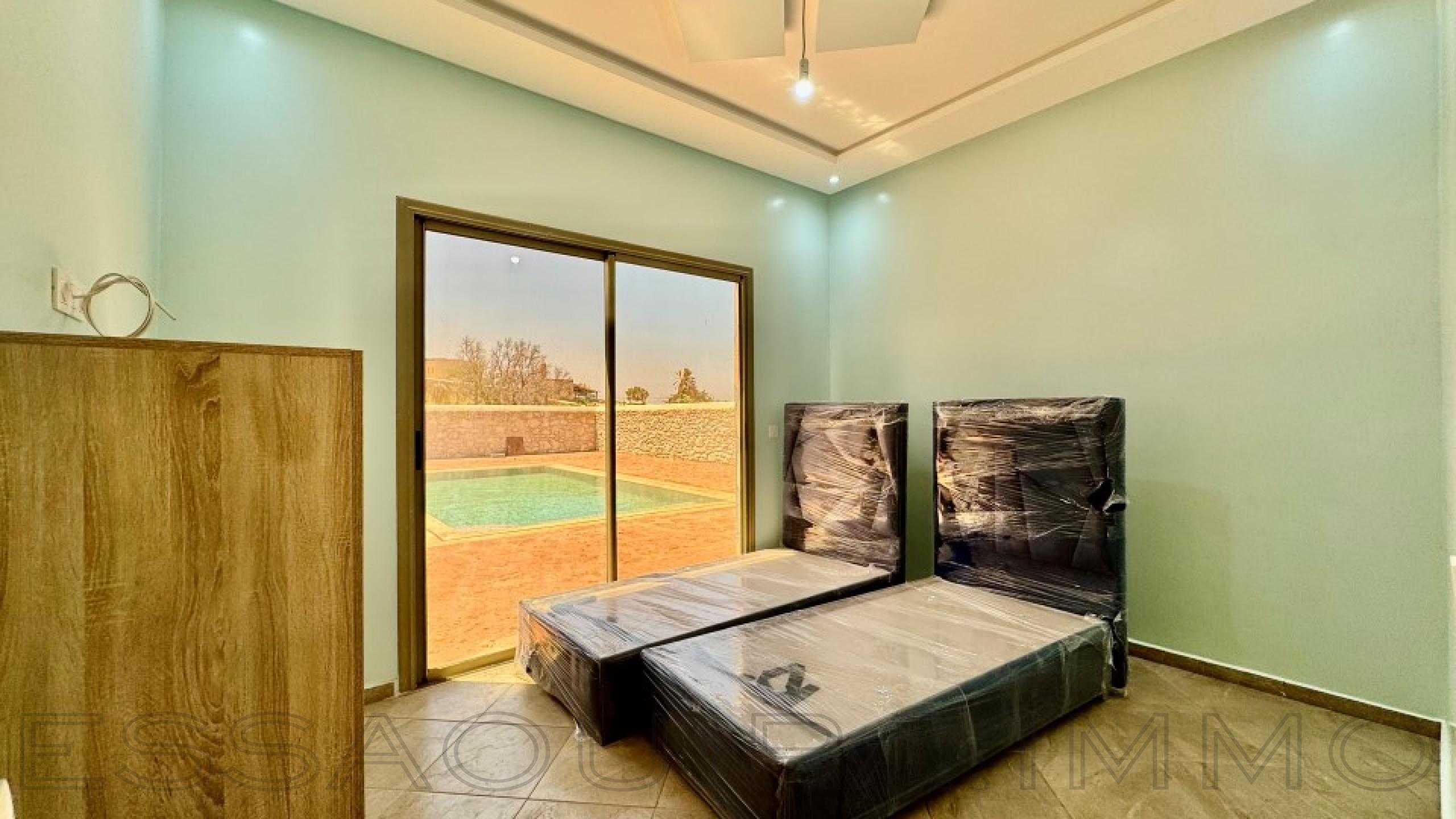 villa avec 2 chambres et 1 salle de bain