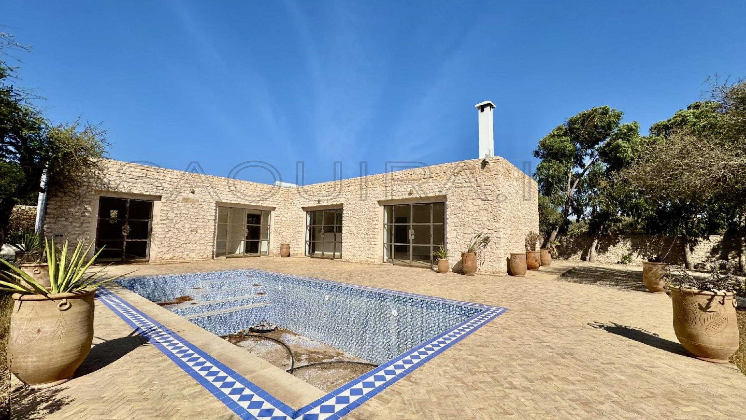 villa avec puits