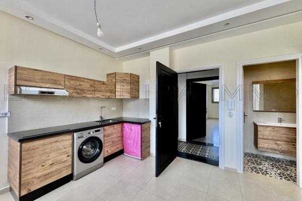 Appartement en Rez-de-Chaussée - Authenticité & Confort Moderne 
