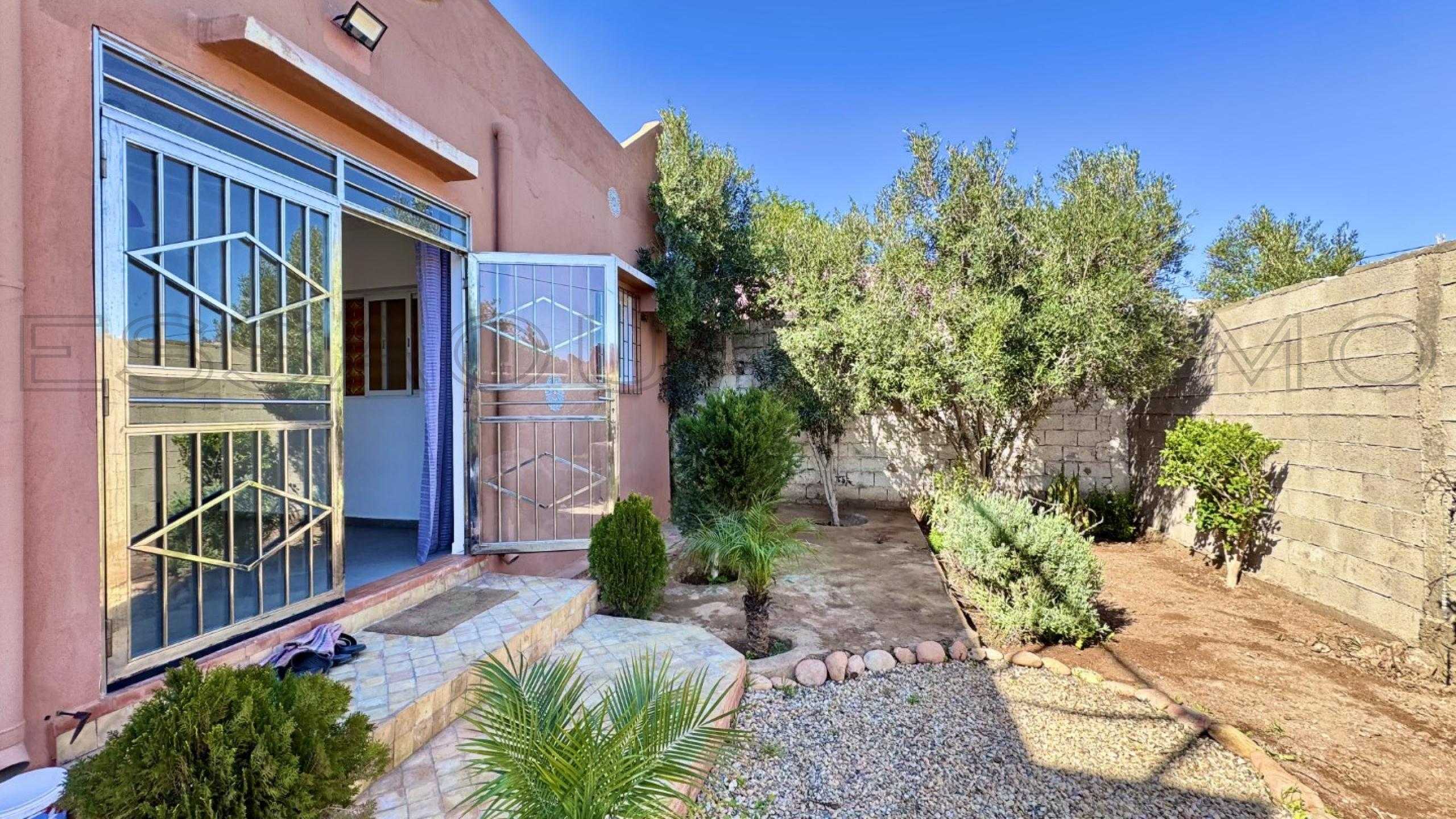 maison de 100 m&sup2; sur un terrain de 400 m&sup2;