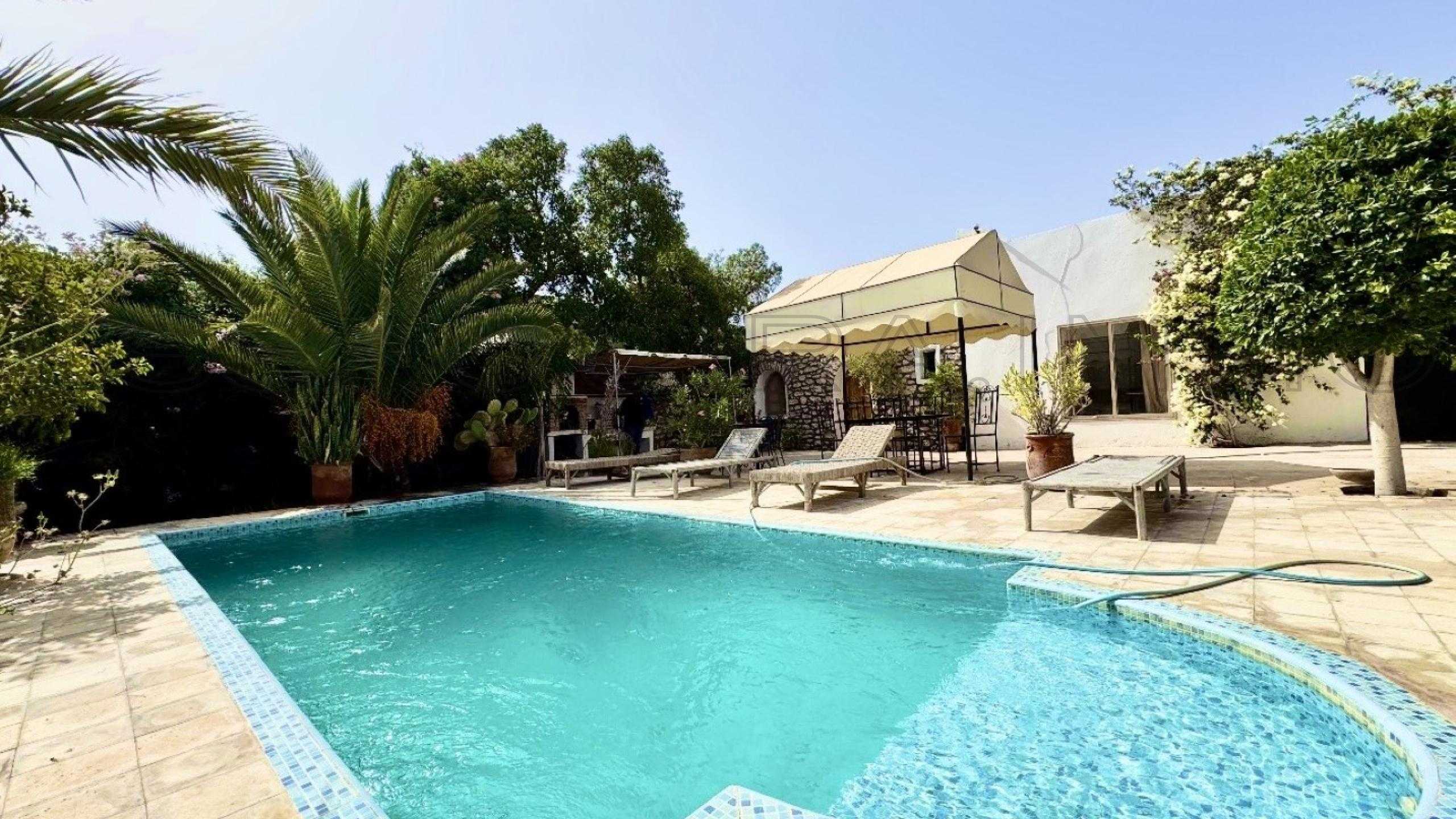 villa avec 4 chambres et 3 salles de bain