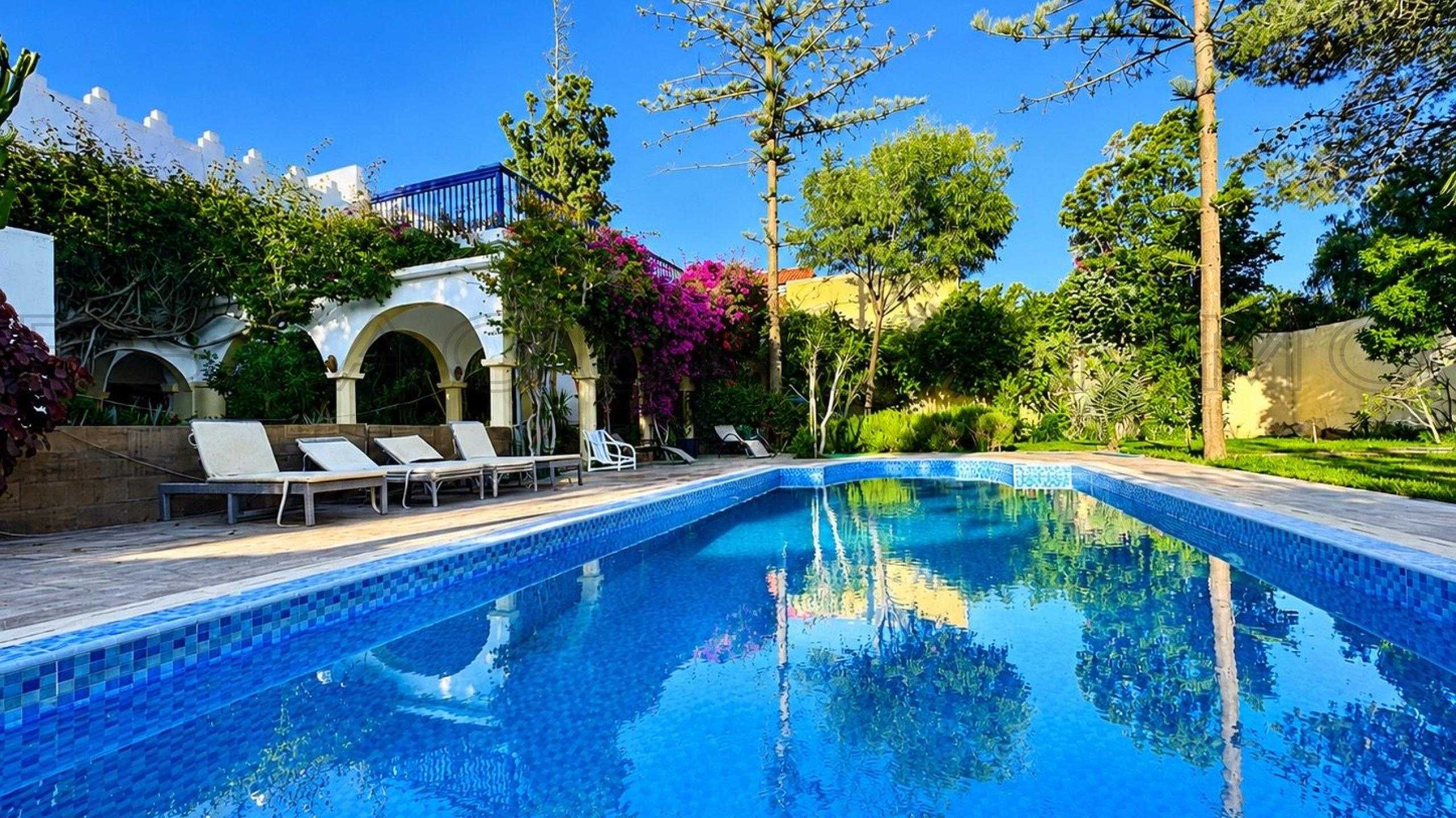 villa avec 5 chambres et 3 salles de bain