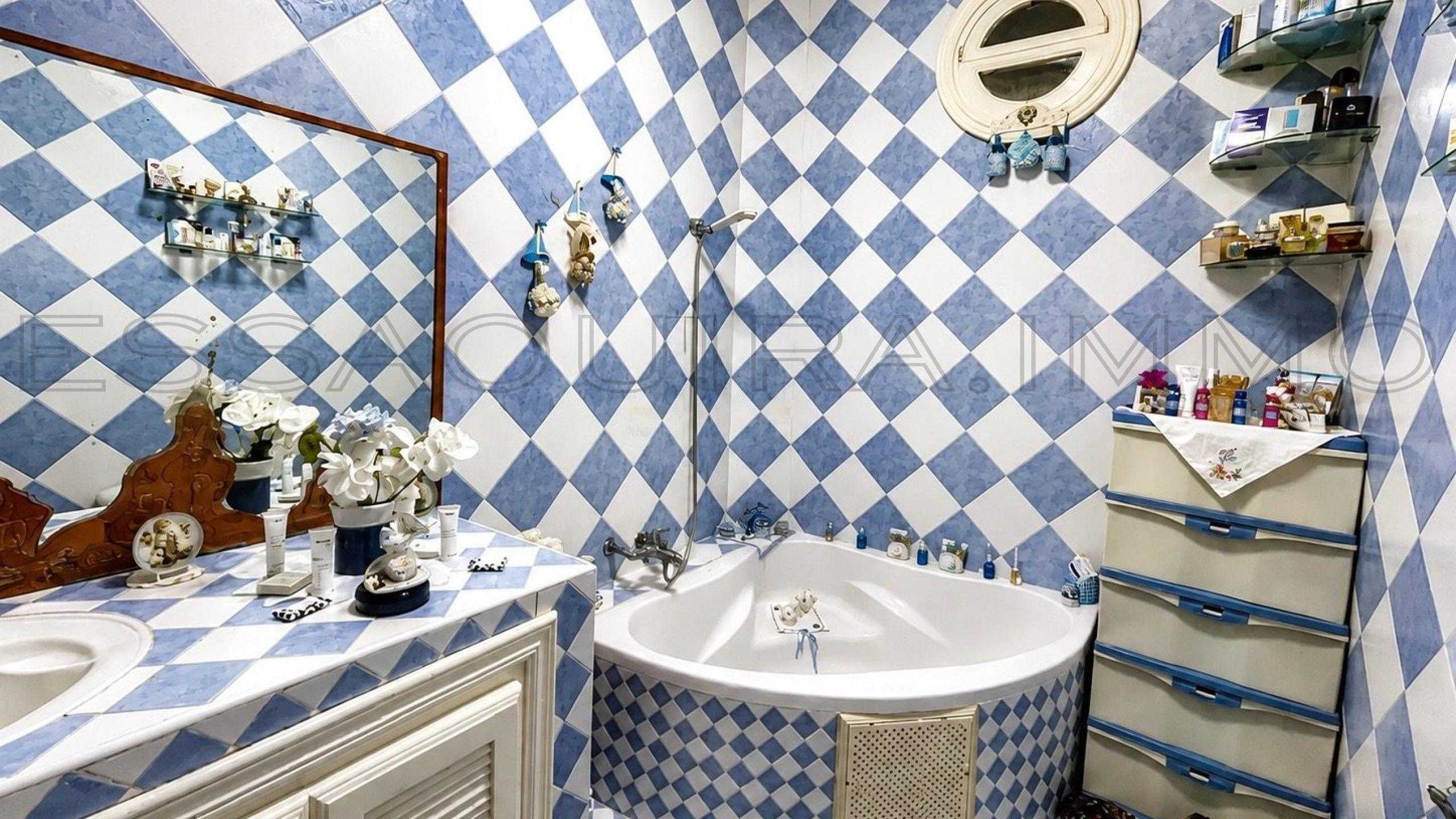 villa avec 4 chambres et 2 salles de bain