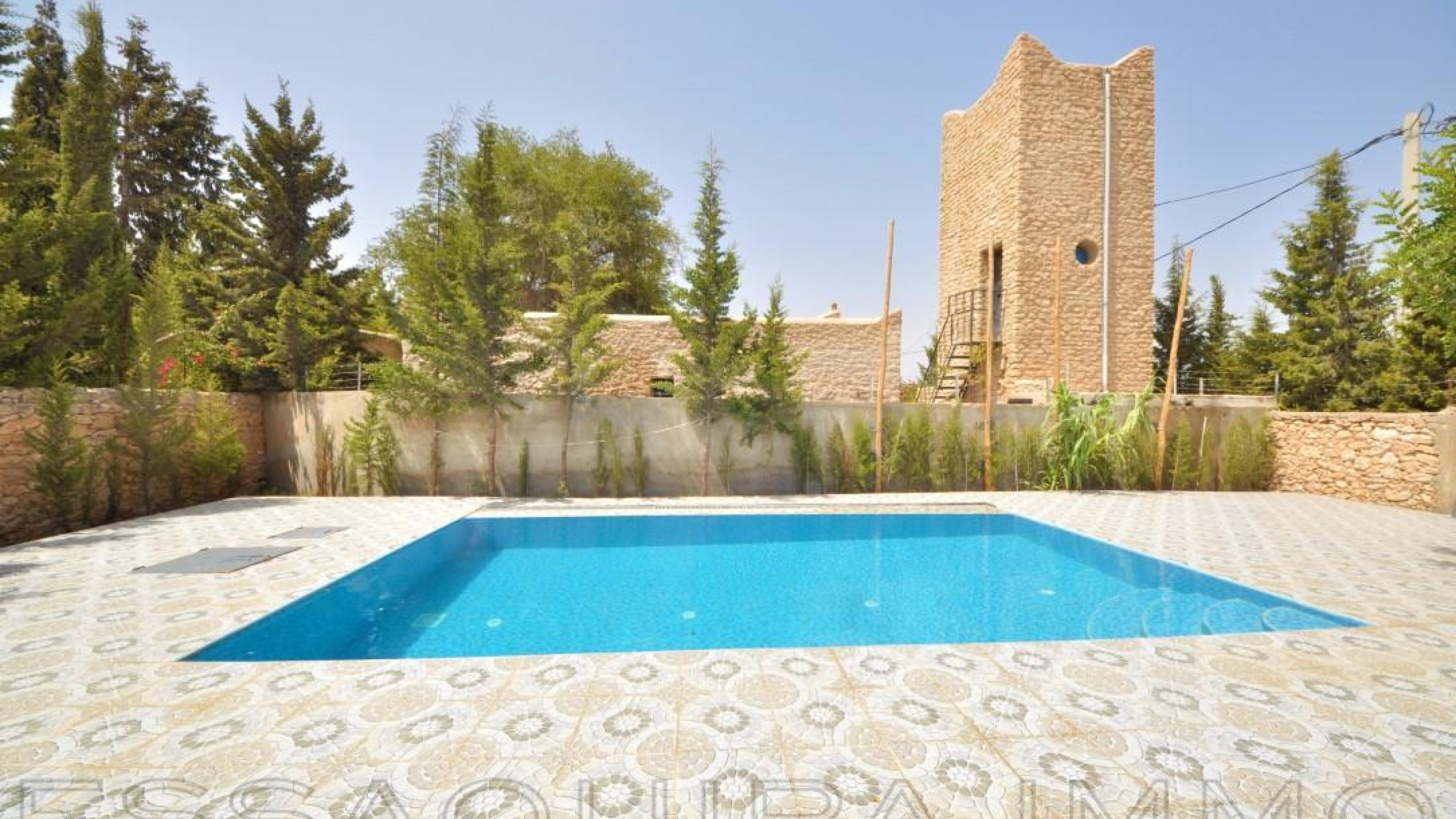 villa de 100 m² sur un terrain de 900 m²